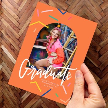 Mpix Graduation Invitation Card with a vivid orange background and falling confetti featuring a personalized senior photo. 