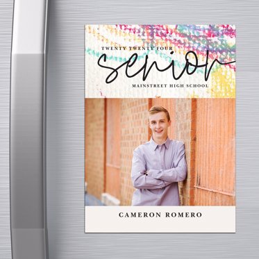 A curated design magnet used as a graduation announcement for a senior personalized with a senior portrait. 