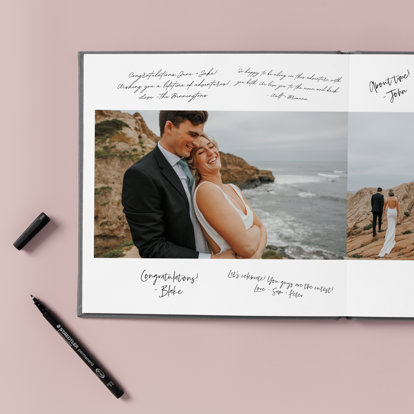 An open wedding guest book featuring photos and handwritten notes from wedding guests.