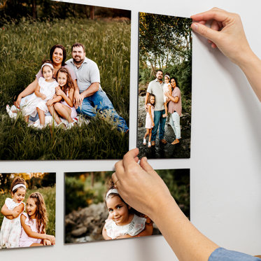 Collage of photo tiles on a wall.