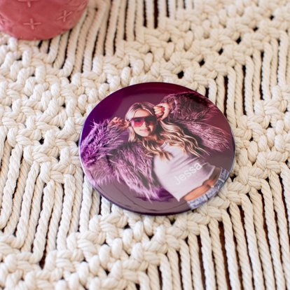 Personalized photo button with a senior picture on the front and durable pinback backing for display