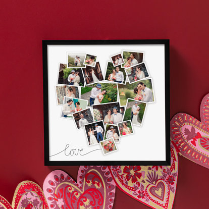 A close up of a person holding a photo wall calendar with a photo on the top half and a calendar grid on the bottom half.