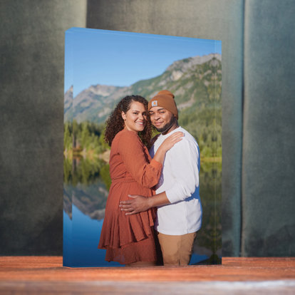 acrylic block resting vertically on a table of a trip to the mountains