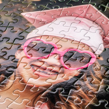 A close up image of a photo puzzle showing the glossy printed surface.