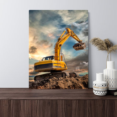 A commercial Metal Print displayed on a table in a waiting room featuring an image of a large piece of construction machinery at work.