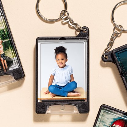 Flashlight keychains featuring back to school photos. 