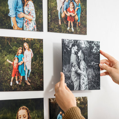 Photo tiles arranged horizontally on a wall with 1" spacing between them, showcasing a beautiful gallery of family photos.