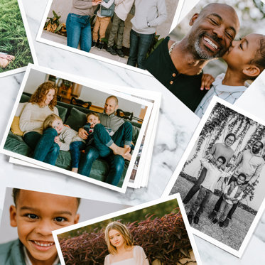 Prints from a Signature Print Set spread out to show various images of a family.