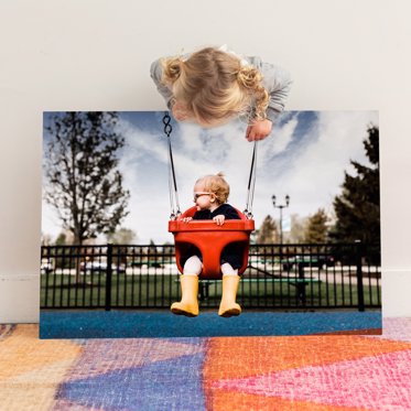 Mpix Large Giclee Photo Print with a photo of a toddler swinging in the park. 