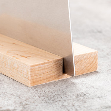 an example of the wooden stand used for tabletop display of smaller metal prints