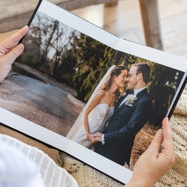 A look at the inside spread of an album showing the giclee printed papers.