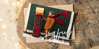 A holiday card with a photo of a child and personal greeting, available at a discount on Mpix.com.