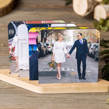 Personalized Photo Coaster Set from Mpix featuring photos of a couple on their wedding day. 