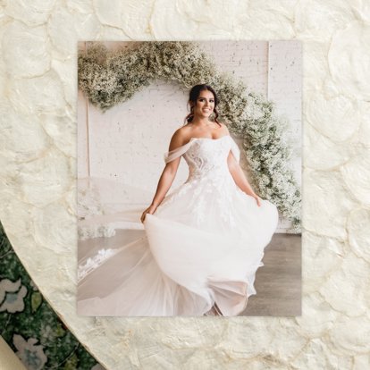 A photo print of a bride in her wedding dress. 