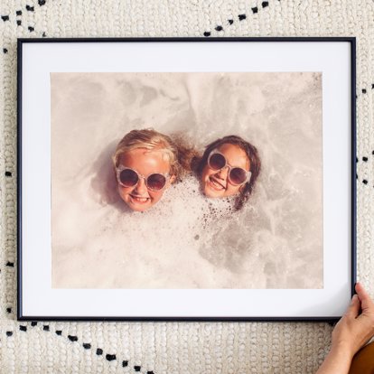 Mpix Matted and Framed Photo Print of two kids buried in the sand. 