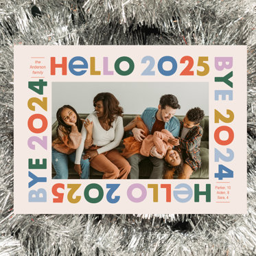 A Card Celebrating the New Year with "Hello 2025, Bye 2024" written in colorful lettering on a white background and room for a personalized photo. 