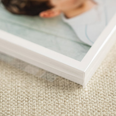 A close up image on the corner of a Signature Print showing the print quality on matte card stock paper.