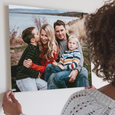 Mpix Metal Photo Print with Family Photos being float mounted to a wall 