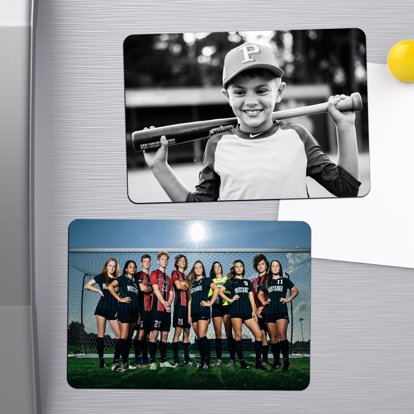 two magnets on a fridge personalized with photos, one in a black and white paper and the other in vivid color