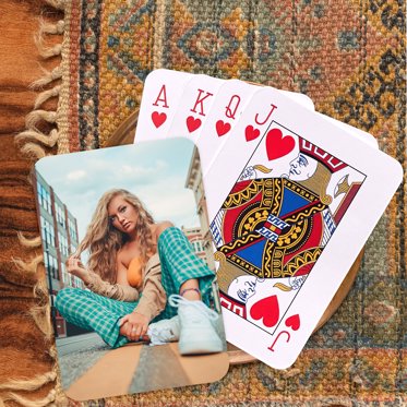 A deck of personalized playing cards from Mpix featuring senior photos on the back of the cards.