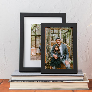 Two Tabletop Framed Photo Prints from Mpix in Black Frames with Family Photos