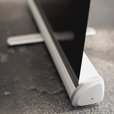 A close up showing the metal base of Mpix Pop-Up Banners that allows the Banner to stand up.