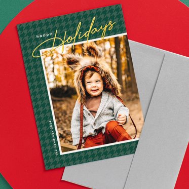 A holiday photo card with that reads "Happy Holidays."