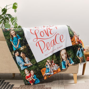 A photo blanket over the back of a couch featuring a collage design of family photos and personalized text.