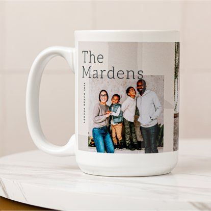 A ceramic photo mug from Mpix featuring an image of a family with personalized text that reads "The Mardens."