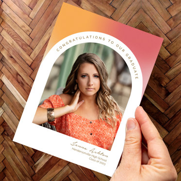 Mpix Graduation Invitation Card with a vivid orange background and falling confetti featuring a personalized senior photo. 