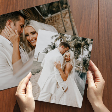 Two wedding photo prints of a bride and groom on their wedding day, one 8x10 and the other 16x20, showcasing the professional quality of Mpix photo prints.