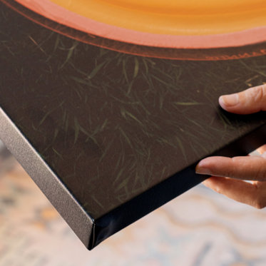 an up close view of a canvas print surface highlighting the proper care of a canvas