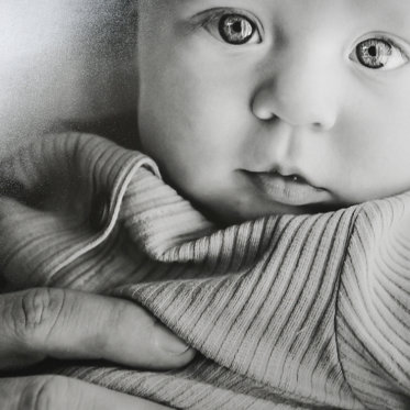An up-close image of a Black and White Print on Semi Gloss Giclee paper.