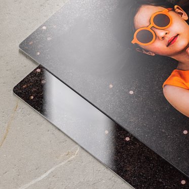 A comparison of the glossy metal print surface, which offers a vibrant shine, with the matte finish option, which offers a smooth finish without glare.