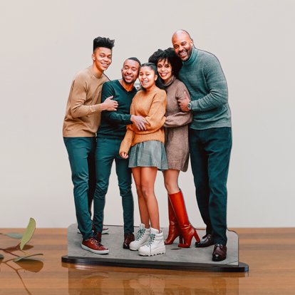 a detailed photo statuette of a family of five standing together