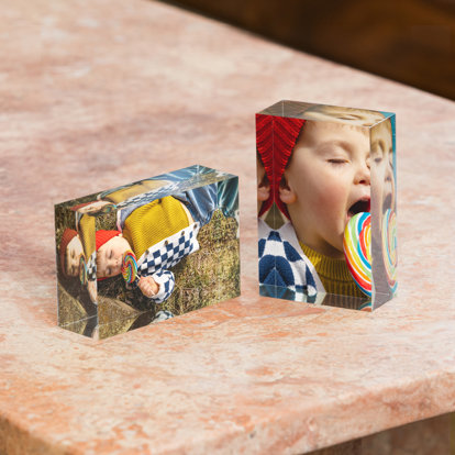  Two 2x3" mini acrylic blocks. One displayed horizontally and the other vertically. Both blocks feature photos of a toddler boy licking a giant colorful lollipop.