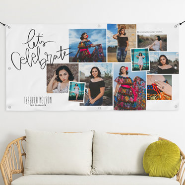 A vinyl banner celebrating a graduating high school senior with photos and text.