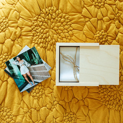 a showcase of how prints are packaged inside the wood photo box
