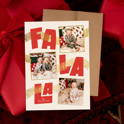 A holiday card featuring three photos of babies in their Christmas pajamas and the words 'Fa La La'. 
