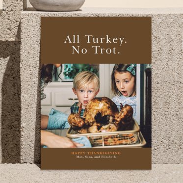 A thanksgiving greeting card from Mpix with all turkey no trot written on a rich brown background above a spot for a personalized family photo. 