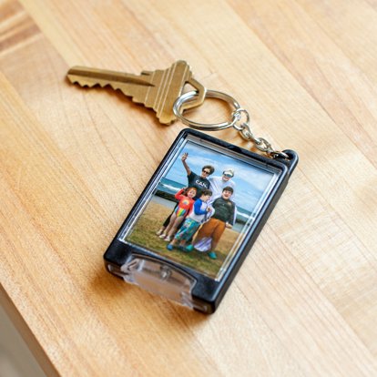 Photo flashlight keychain with a family vacation photo.