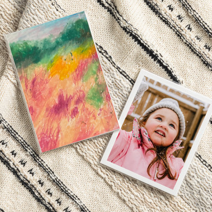 Two Signature Print Sets - one featuring artwork and one featuring images from a family session.
